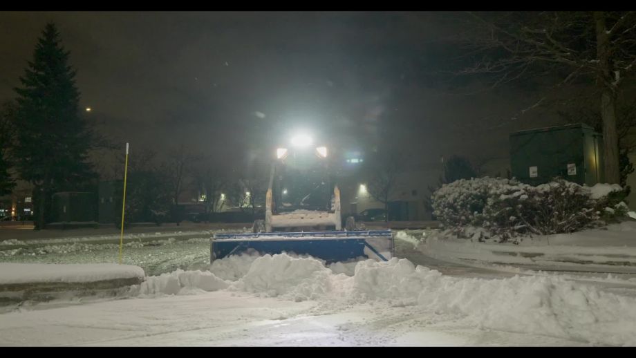 A commercial parking area cleared of snow by Black Swan Landscaping’s professional snow contractor services ensures a safe and accessible environment at your Bolton business.