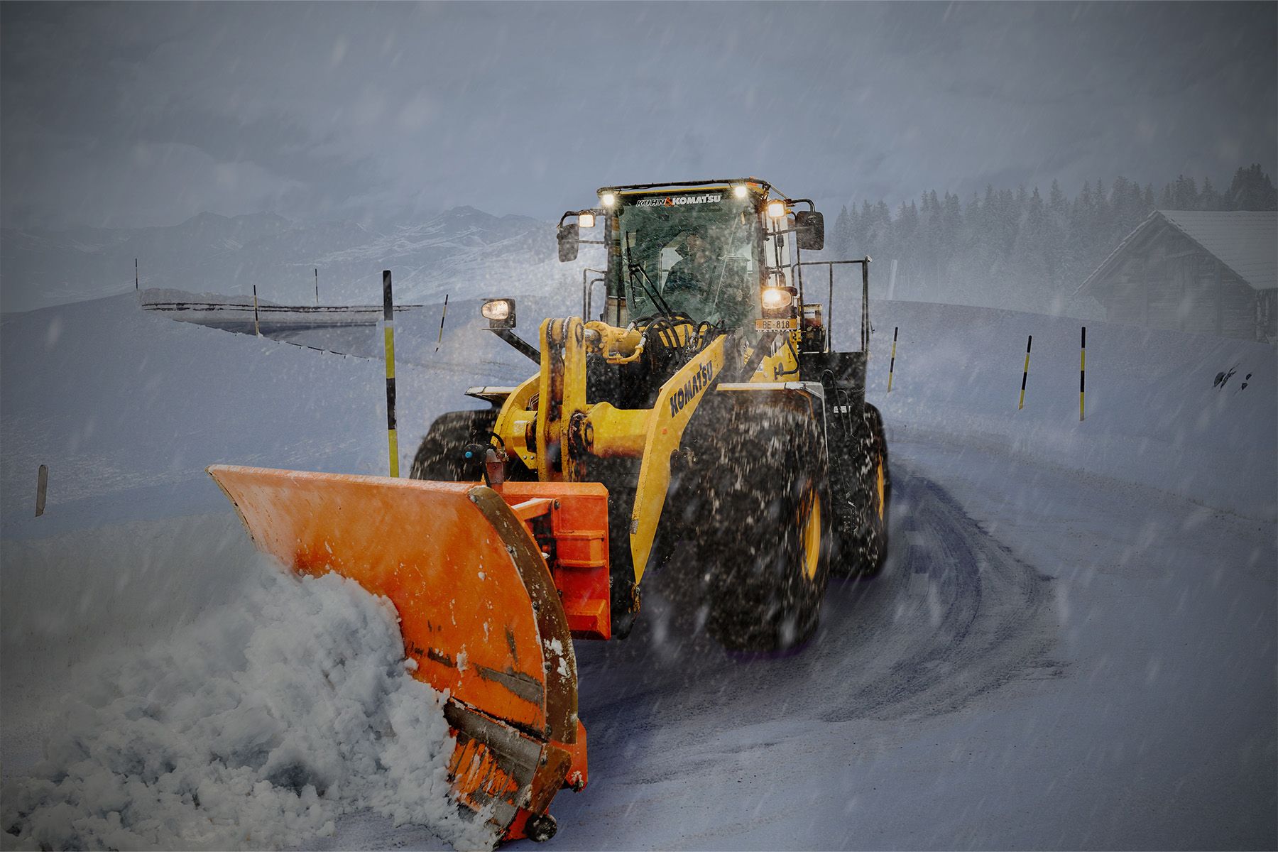 Black Swan Landscaping crew using advanced snow blowers to tackle snowstorms on a Caledon, Ontario, commercial property.